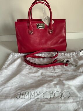 New with tag, Jimmy Choo Red Leather Purse with dust bag and shoulder strap.